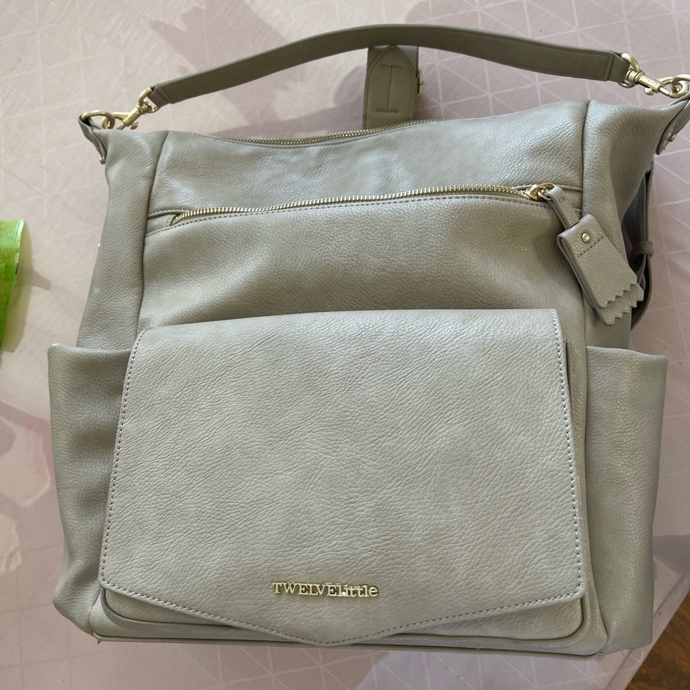 Twelvelittle peek-a-boo diaper bag backpack